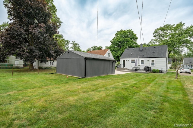 2220 Cummings Ave, Berkley, MI 48072 - rear view of house featuring an outbuilding and a patio