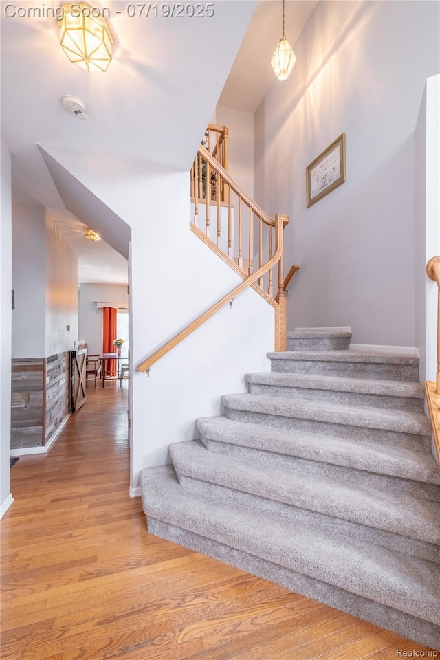1884 Autumn Glen Dr, Howell, MI 48843 - stairway featuring wood finished floors and baseboards