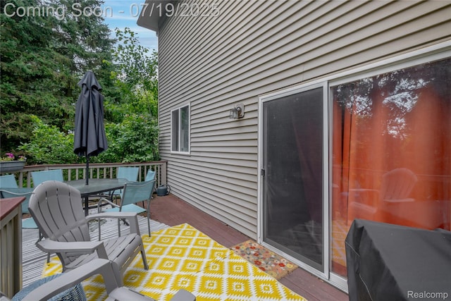 1884 Autumn Glen Dr, Howell, MI 48843 - wooden deck with outdoor dining area