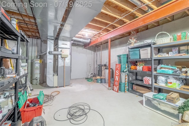 1884 Autumn Glen Dr, Howell, MI 48843 - unfinished below grade area with heating unit and gas water heater