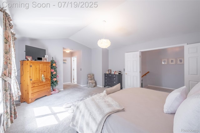 1884 Autumn Glen Dr, Howell, MI 48843 - carpeted bedroom featuring lofted ceiling and baseboards