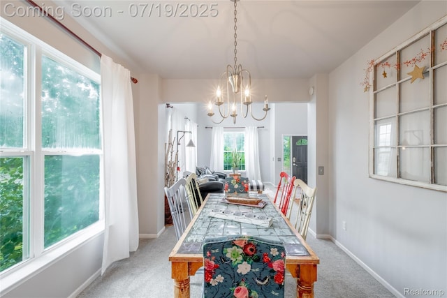 1884 Autumn Glen Dr, Howell, MI 48843 - dining area featuring a chandelier and light colored carpet