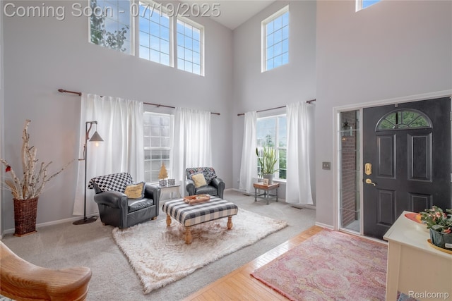 1884 Autumn Glen Dr, Howell, MI 48843 - entryway featuring a high ceiling and baseboards