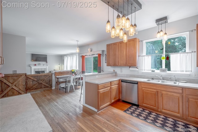 1884 Autumn Glen Dr, Howell, MI 48843 - kitchen with light wood-style floors, healthy amount of natural light, and light countertops