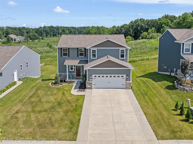 2838 Bogues View Dr, Howell, MI 48843 - craftsman-style house with stone siding, concrete driveway, a front yard, and a garage