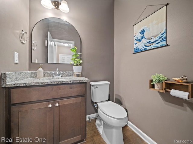2838 Bogues View Dr, Howell, MI 48843 - half bath featuring wood finished floors and vanity