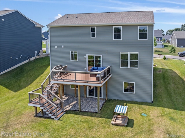 2838 Bogues View Dr, Howell, MI 48843 - back of house featuring a wooden deck, stairs, and a yard