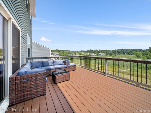 2838 Bogues View Dr, Howell, MI 48843 - wooden terrace featuring outdoor lounge area
