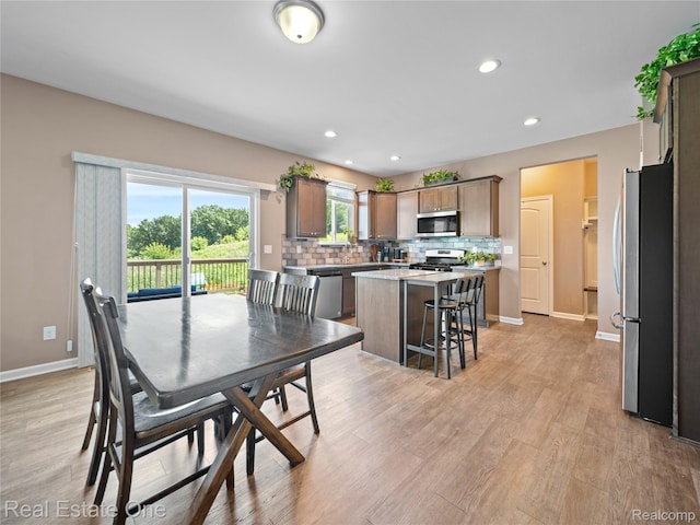2838 Bogues View Dr, Howell, MI 48843 - dining space with recessed lighting and light wood-type flooring