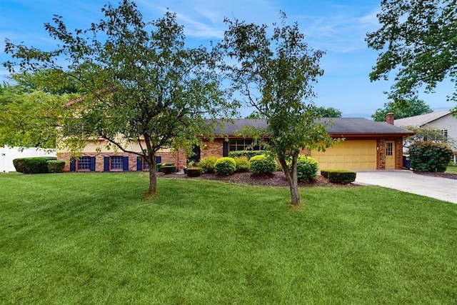 1330 Desmond St, Saint Joseph, MI 49085 - single story home with an attached garage, concrete driveway, and a front lawn
