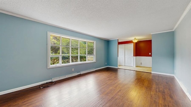 1330 Desmond St, Saint Joseph, MI 49085 - empty room featuring a baseboard heating unit, a textured ceiling, ornamental molding, and wood finished floors