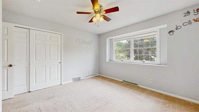 1330 Desmond St, Saint Joseph, MI 49085 - unfurnished bedroom with carpet flooring, a closet, and ceiling fan