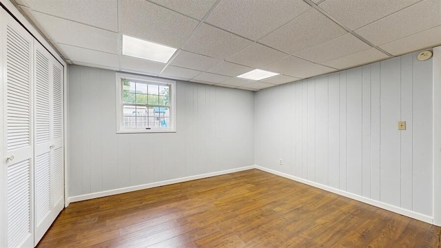 1330 Desmond St, Saint Joseph, MI 49085 - unfurnished bedroom featuring wood finished floors, a drop ceiling, and a closet