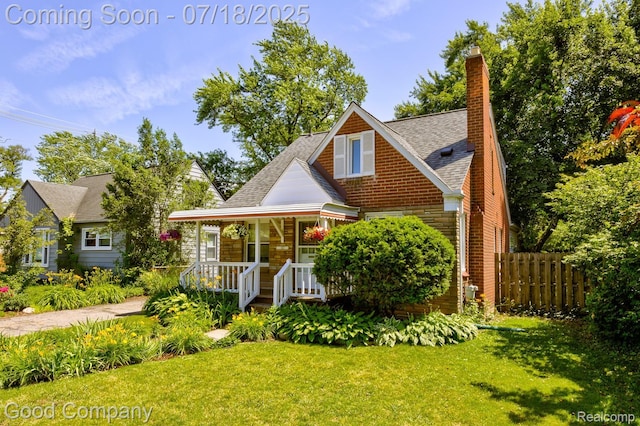 1517 W Troy St, Ferndale, MI 48220 - view of front of property featuring a porch, roof with shingles, and a chimney