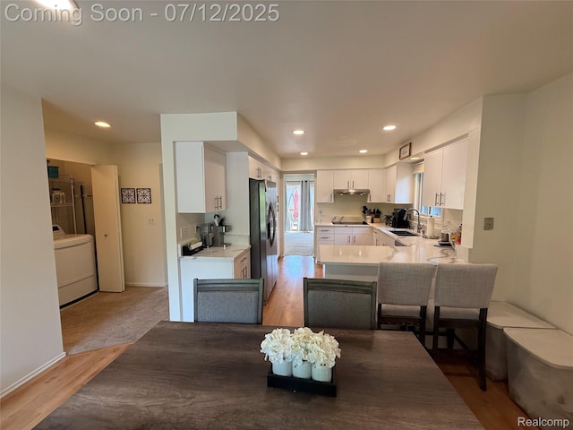 4178 Breckenridge Dr, West Bloomfield, MI 48322 - dining space with washer / dryer, light wood-type flooring, and recessed lighting