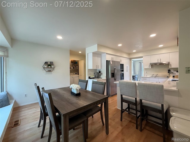 4178 Breckenridge Dr, West Bloomfield, MI 48322 - dining room featuring independent washer and dryer, light wood-style flooring, and recessed lighting