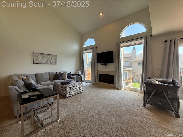4178 Breckenridge Dr, West Bloomfield, MI 48322 - carpeted living area with high vaulted ceiling, plenty of natural light, and a tiled fireplace