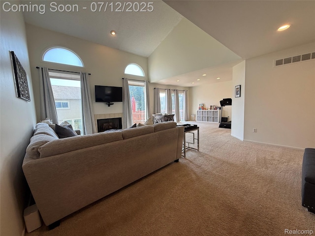 4178 Breckenridge Dr, West Bloomfield, MI 48322 - living area featuring carpet flooring, a tile fireplace, high vaulted ceiling, and recessed lighting