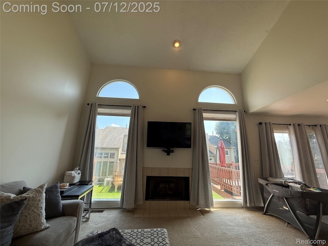 4178 Breckenridge Dr, West Bloomfield, MI 48322 - living room with carpet flooring, healthy amount of natural light, a tile fireplace, and a high ceiling