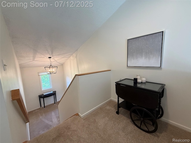 4178 Breckenridge Dr, West Bloomfield, MI 48322 - staircase featuring a textured ceiling, carpet floors, and a chandelier
