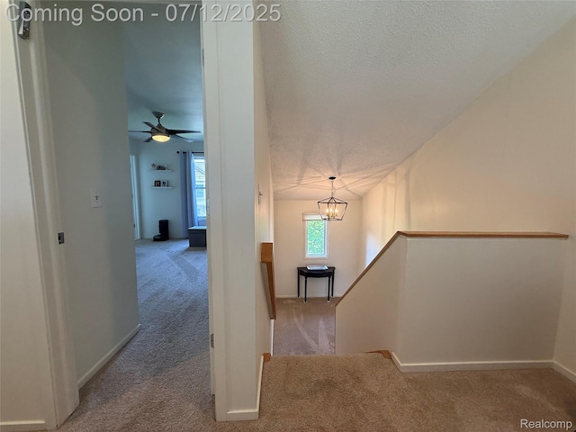 4178 Breckenridge Dr, West Bloomfield, MI 48322 - stairs featuring carpet flooring, a chandelier, a textured ceiling, and ceiling fan