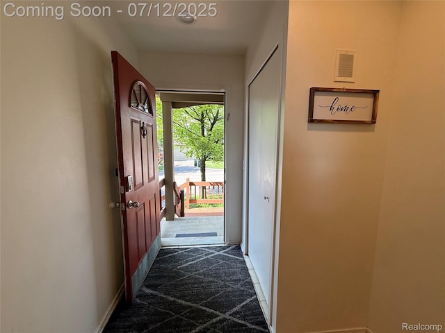 4178 Breckenridge Dr, West Bloomfield, MI 48322 - entryway featuring baseboards and dark colored carpet