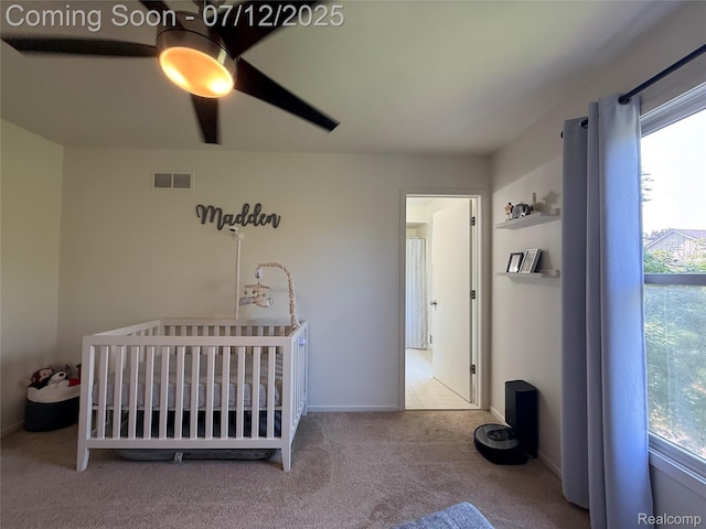 4178 Breckenridge Dr, West Bloomfield, MI 48322 - carpeted bedroom with a crib and a ceiling fan
