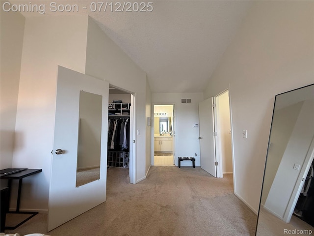4178 Breckenridge Dr, West Bloomfield, MI 48322 - unfurnished bedroom with vaulted ceiling, carpet floors, a spacious closet, and ensuite bathroom
