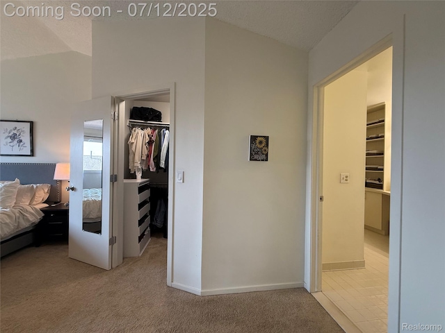 4178 Breckenridge Dr, West Bloomfield, MI 48322 - bedroom with a spacious closet, carpet flooring, and lofted ceiling