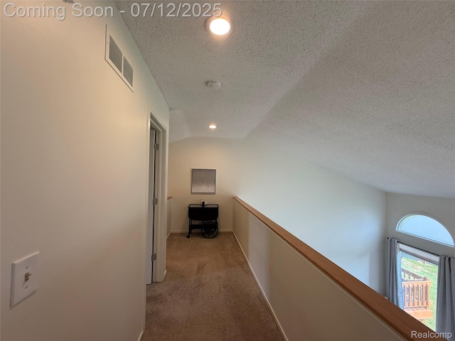 4178 Breckenridge Dr, West Bloomfield, MI 48322 - corridor featuring a textured ceiling, carpet floors, and vaulted ceiling
