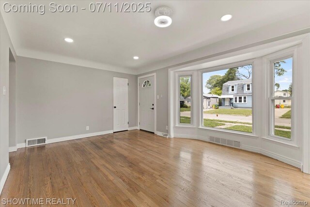 23041 Shakespeare Ave, Eastpointe, MI 48021 - unfurnished room with wood finished floors and recessed lighting