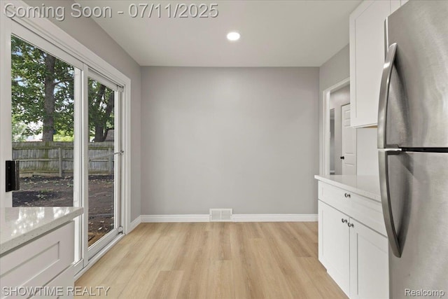 23041 Shakespeare Ave, Eastpointe, MI 48021 - unfurnished dining area featuring light wood-style floors and recessed lighting