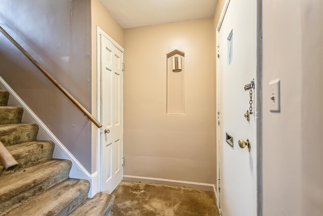 303 Wesley St, Ann Arbor, MI 48103 - doorway to outside featuring stairway and baseboards