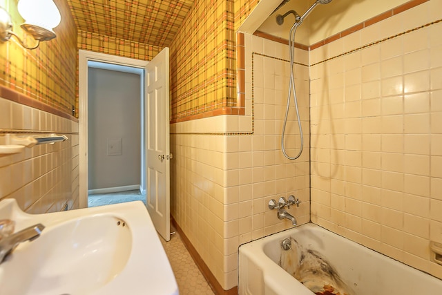 303 Wesley St, Ann Arbor, MI 48103 - bathroom featuring shower / tub combination and tile walls