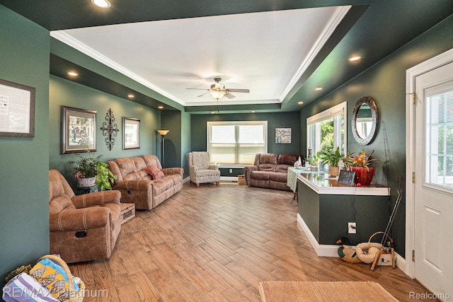 16344 Waterview Ln, Linden, MI 48451 - living room featuring crown molding, wood finished floors, ceiling fan, a raised ceiling, and plenty of natural light