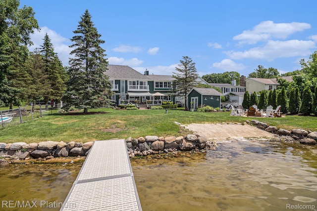 16344 Waterview Ln, Linden, MI 48451 - dock area featuring an outdoor fire pit and a water view