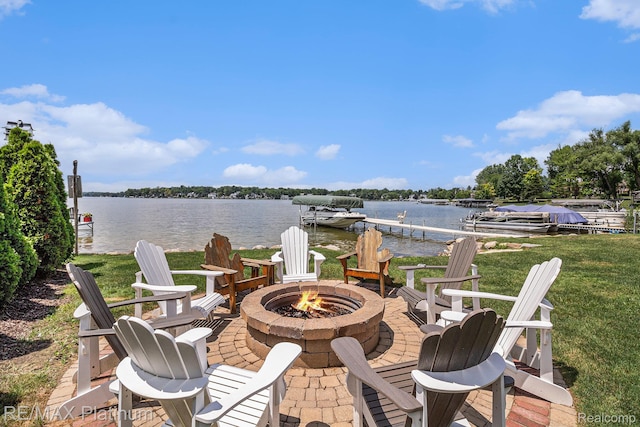 16344 Waterview Ln, Linden, MI 48451 - view of patio with a fire pit, a water view, and a dock