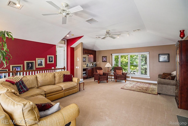 16344 Waterview Ln, Linden, MI 48451 - living room with vaulted ceiling, a ceiling fan, and light carpet