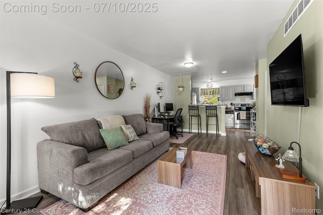 23486 Boller Ct, Trenton, MI 48183 - living area featuring dark wood-style flooring and an office area