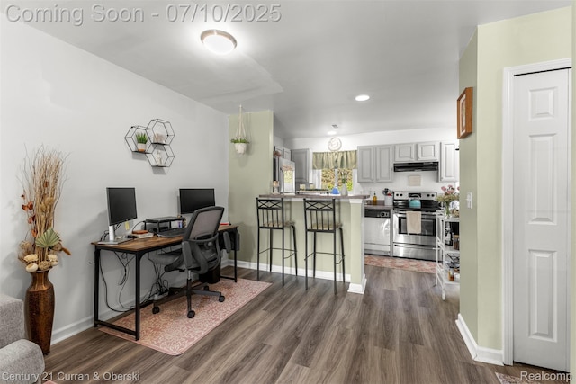 23486 Boller Ct, Trenton, MI 48183 - office with dark wood finished floors and recessed lighting