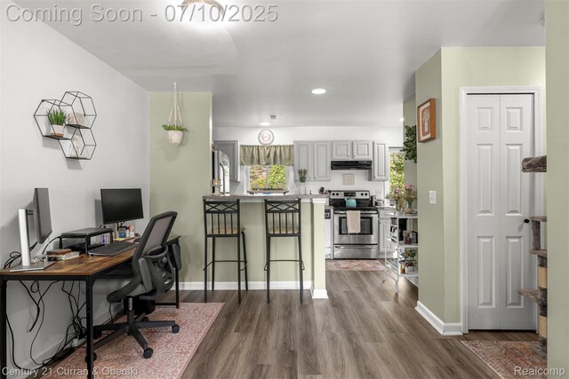 23486 Boller Ct, Trenton, MI 48183 - office featuring dark wood-style flooring and recessed lighting