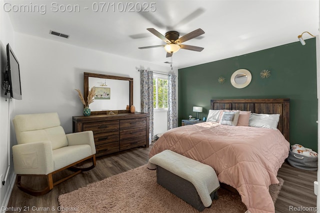 23486 Boller Ct, Trenton, MI 48183 - bedroom featuring wood finished floors, ceiling fan, and an accent wall