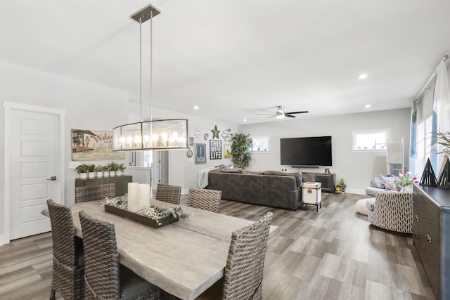 18734 Leonard Ct, New Buffalo, MI 49117 - dining area featuring ceiling fan, light wood-style floors, a chandelier, and recessed lighting