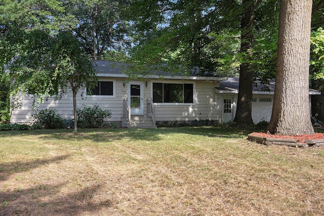 19160 Glendale Cir, Spring Lake, MI 49456 - view of front of house with a front yard and an attached garage