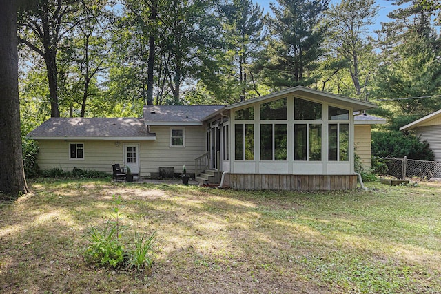 19160 Glendale Cir, Spring Lake, MI 49456 - rear view of property with a sunroom and entry steps