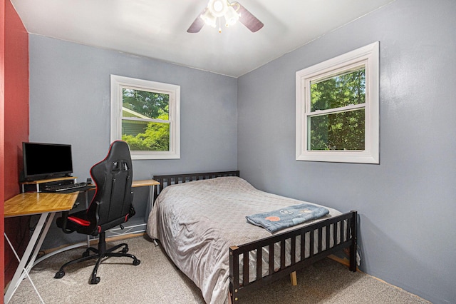 19160 Glendale Cir, Spring Lake, MI 49456 - bedroom with multiple windows, carpet floors, a ceiling fan, and a desk