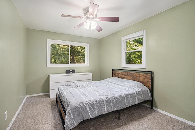 19160 Glendale Cir, Spring Lake, MI 49456 - carpeted bedroom with baseboards and ceiling fan