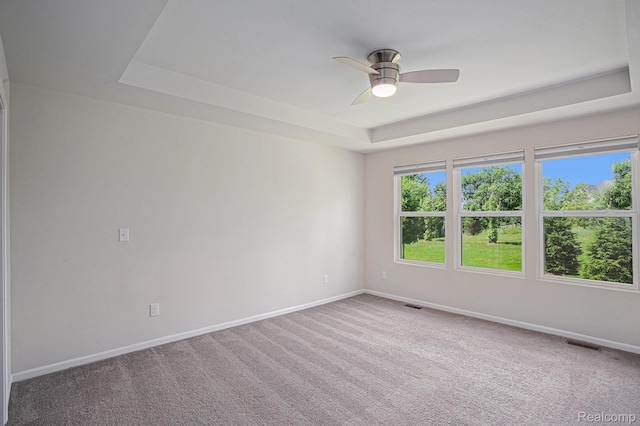 24727 Ivy Ln, Novi, MI 48375 - carpeted spare room with a raised ceiling and ceiling fan