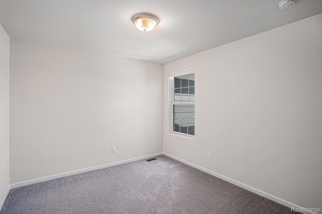 24727 Ivy Ln, Novi, MI 48375 - empty room with a smoke detector and carpet