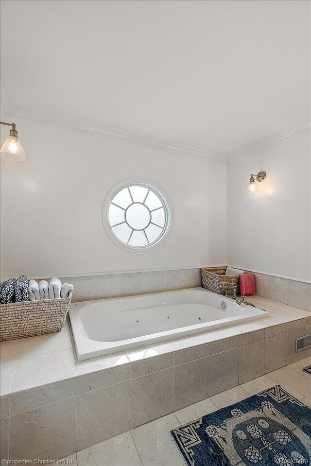 364 Chesterfield Ave, Birmingham, MI 48009 - bathroom with ornamental molding, a tub with jets, and tile patterned floors
